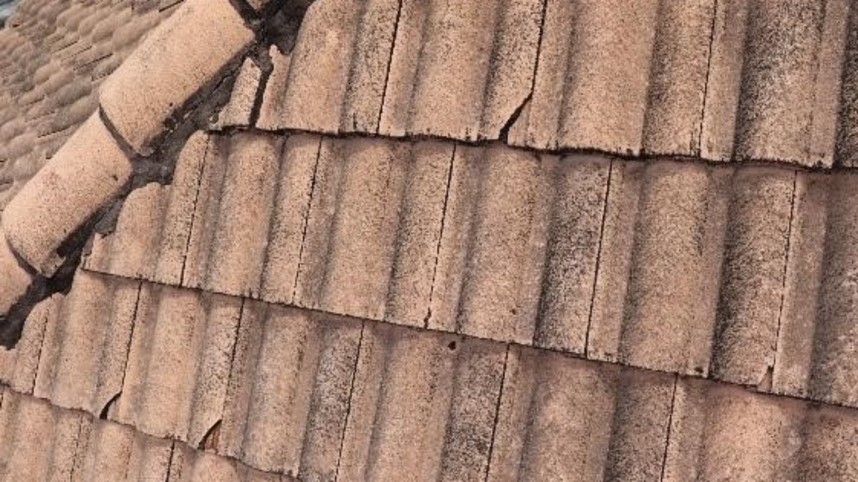 broken-tiles-crack-the-roof-mates